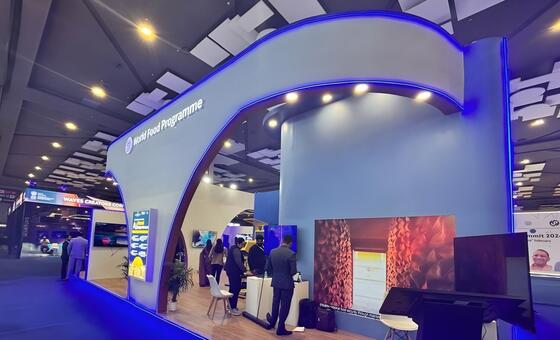 Cabina del Programa Mundial de Alimentos en la Cumbre de IA 2024, India